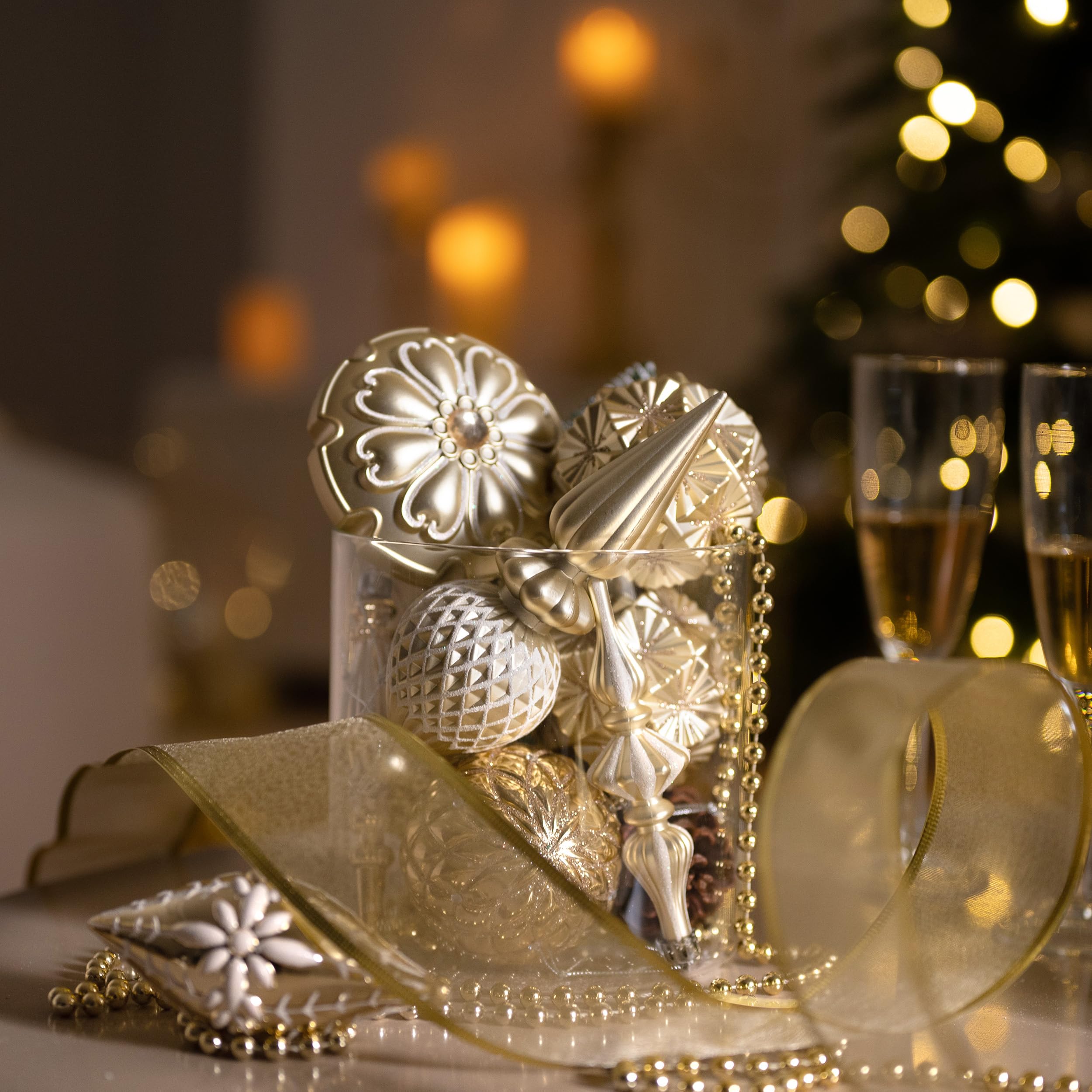 Valery Madelyn ornaments hanging on lit tree demonstrating elegant visual impact