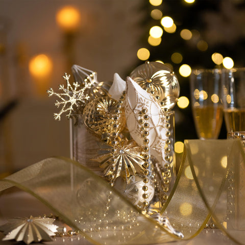 Valery Madelyn ornaments hanging on a decorated tree adding cohesive seasonal sparkle