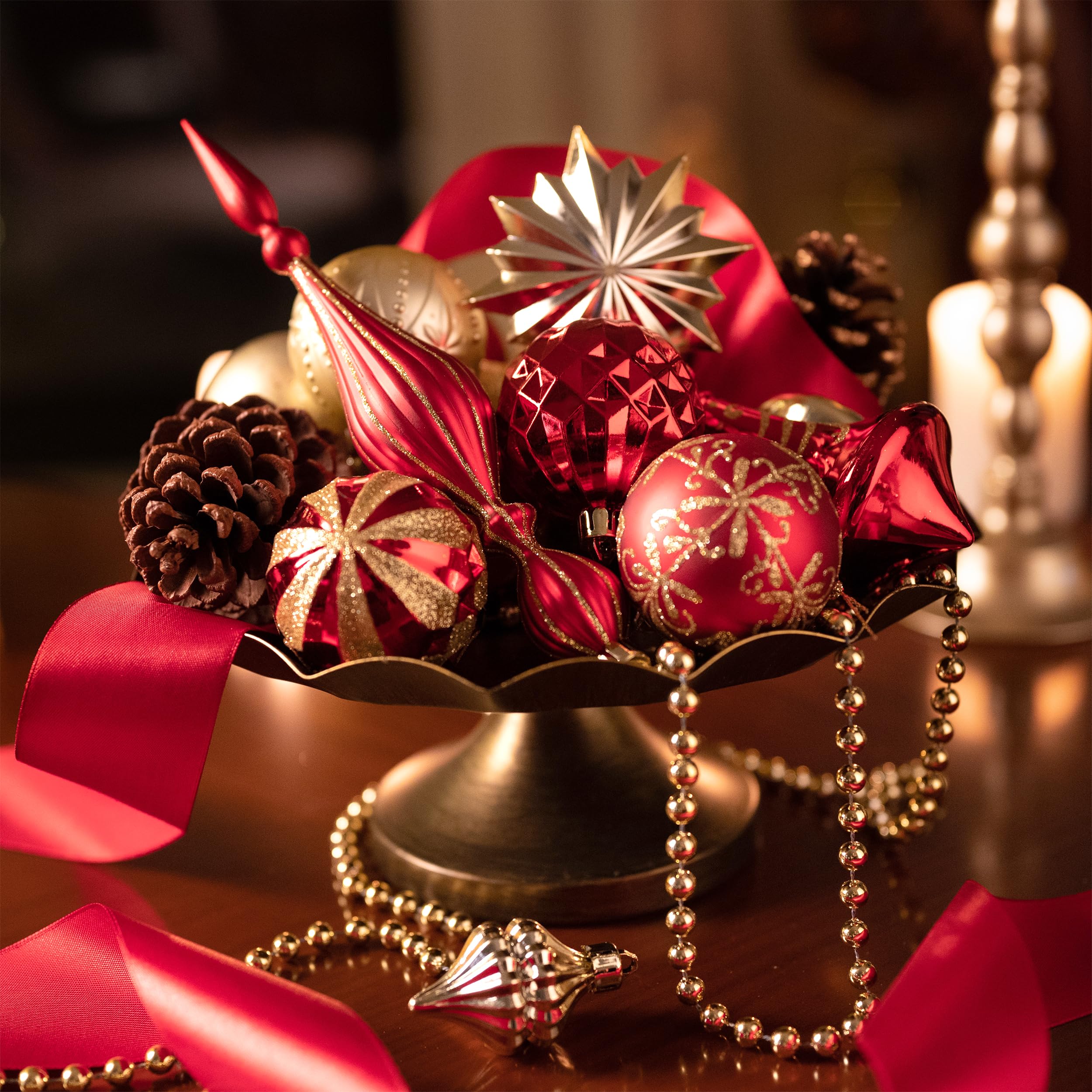 Valery Madelyn ornaments hanging on tree demonstrating cohesive red and gold ambiance