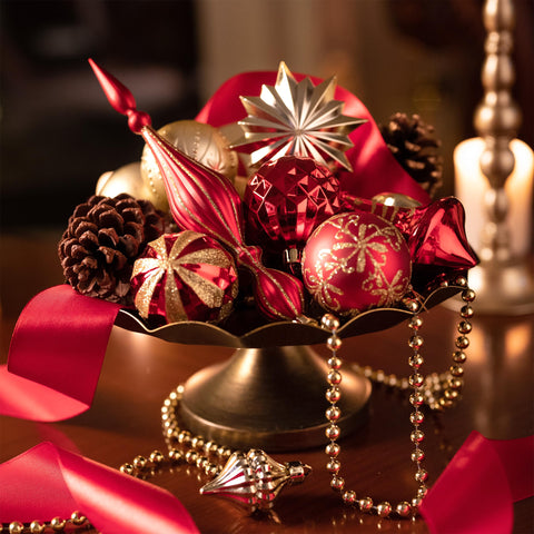 Valery Madelyn ornaments hanging on tree demonstrating cohesive red and gold ambiance