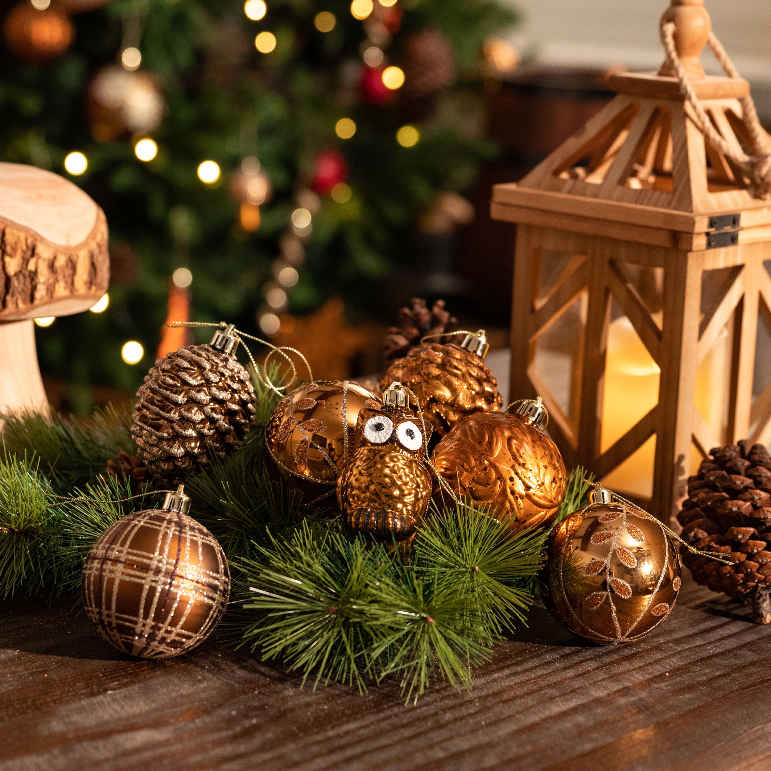Valery Madelyn ornaments hung on tree creating warm copper-gold holiday ambiance