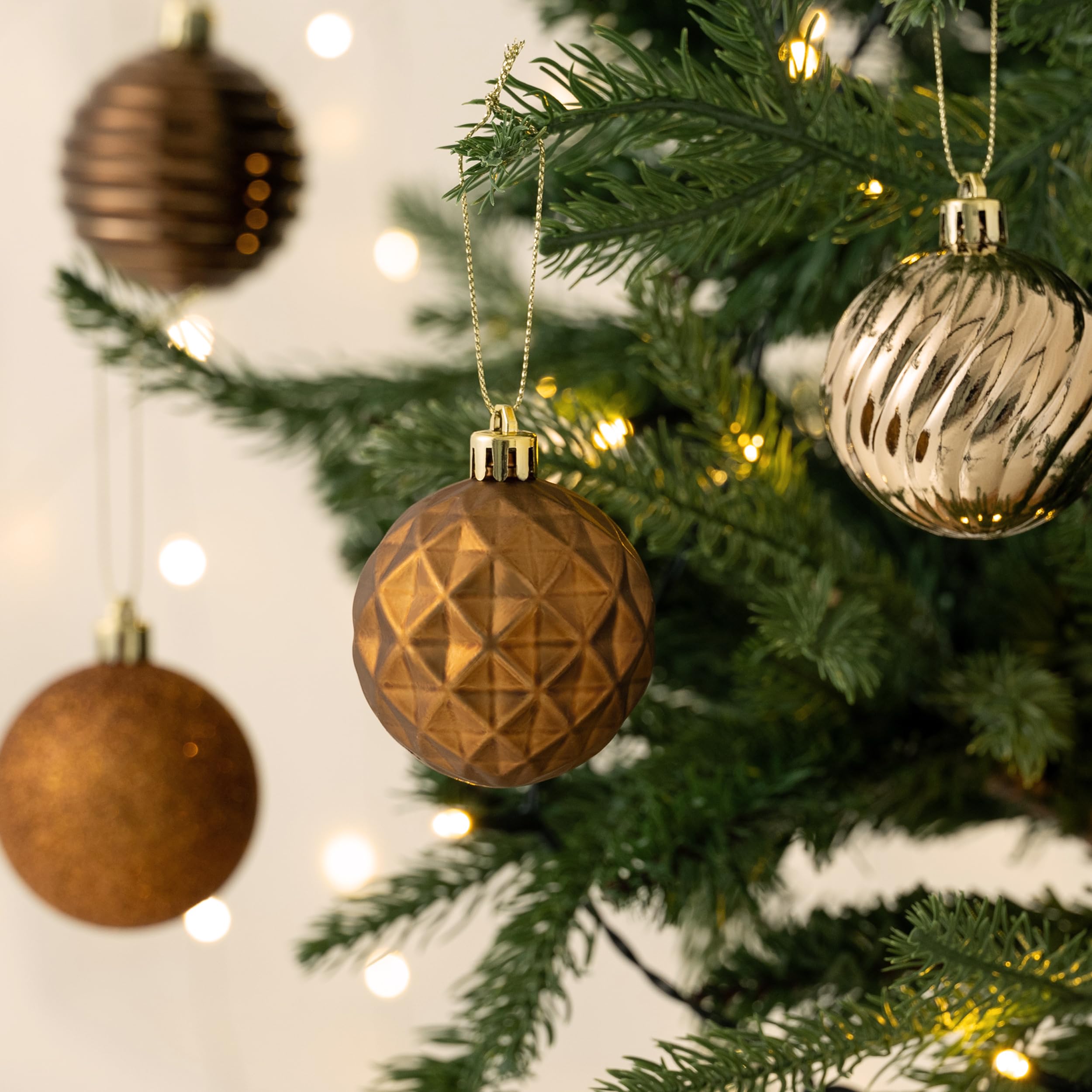 Valery Madelyn ornaments in a table centerpiece adding reusable seasonal flair