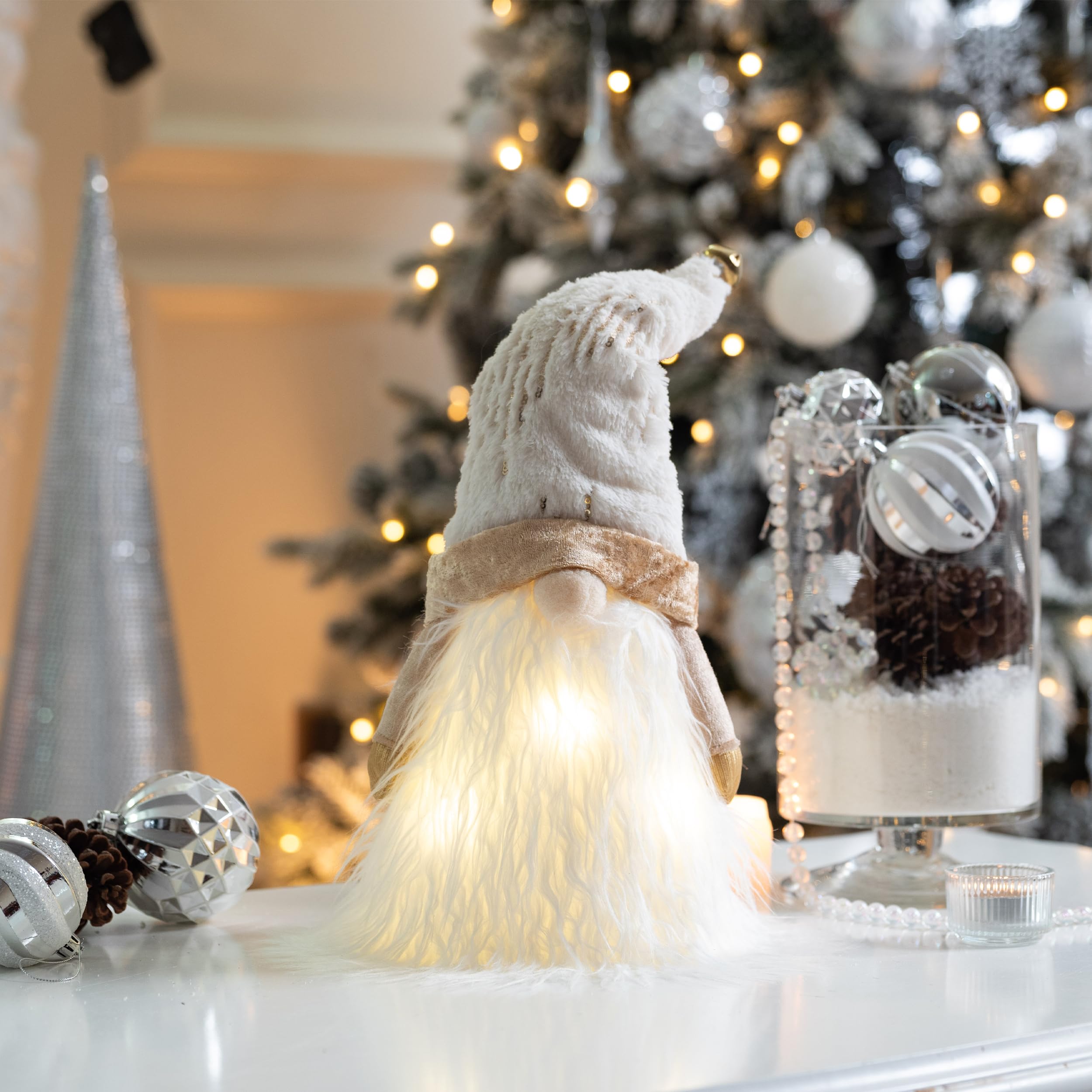 Valery Madelyn lit topper on tree showing warm LED glow creating cozy ambiance