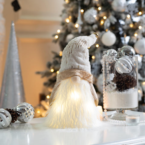 Valery Madelyn lit topper on tree showing warm LED glow creating cozy ambiance