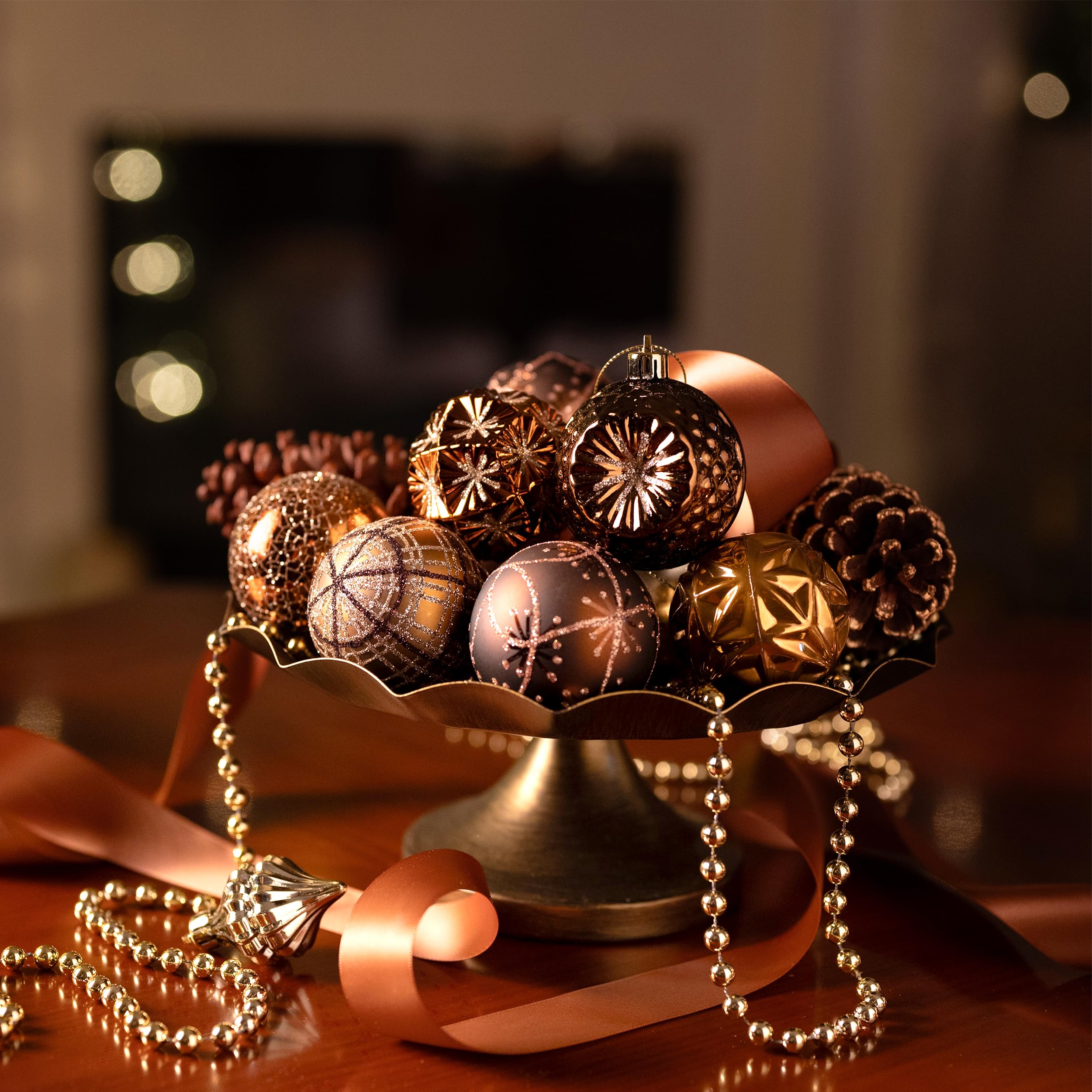 Valery Madelyn ornaments hung on an autumn-themed tree providing warm harvest ambiance