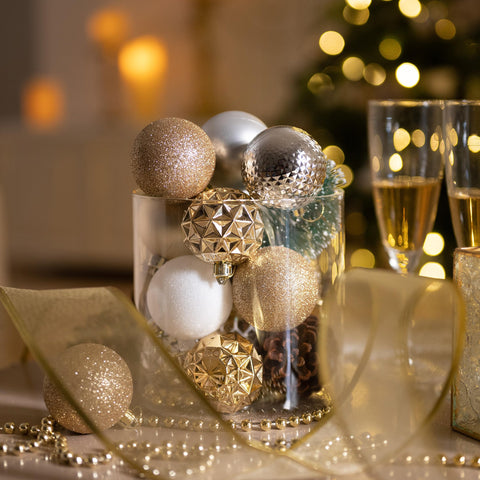 Valery Madelyn ornaments hung on a tree showing cohesive silver styling benefit