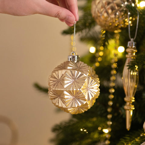 Valery Madelyn ornaments next to ruler for size and scale clarity