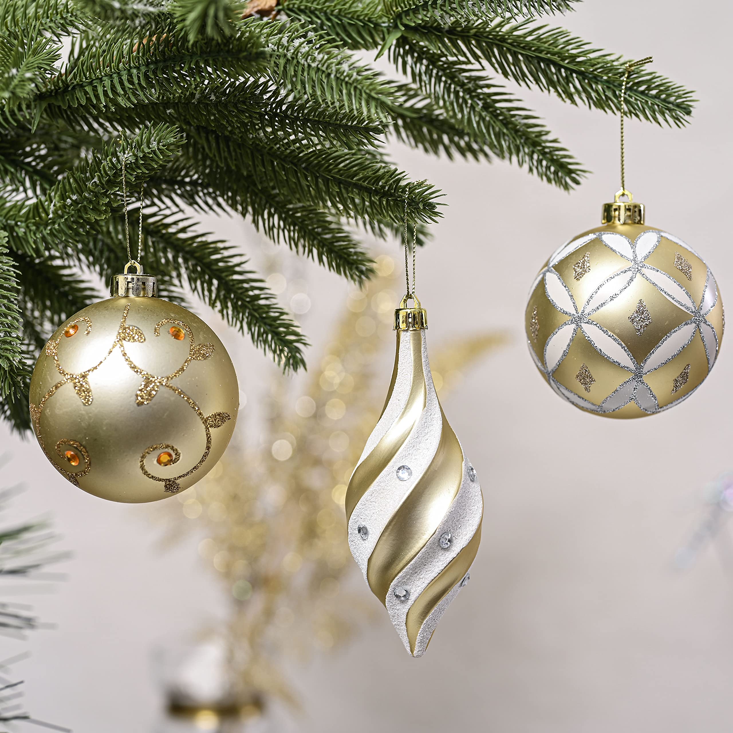 Valery Madelyn ornament next to a hand showing scale and lightweight benefit