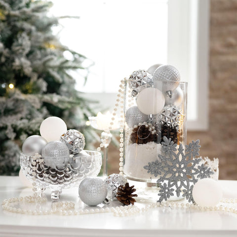 Valery Madelyn ornament next to ruler showing 2.36-inch size for planning benefits