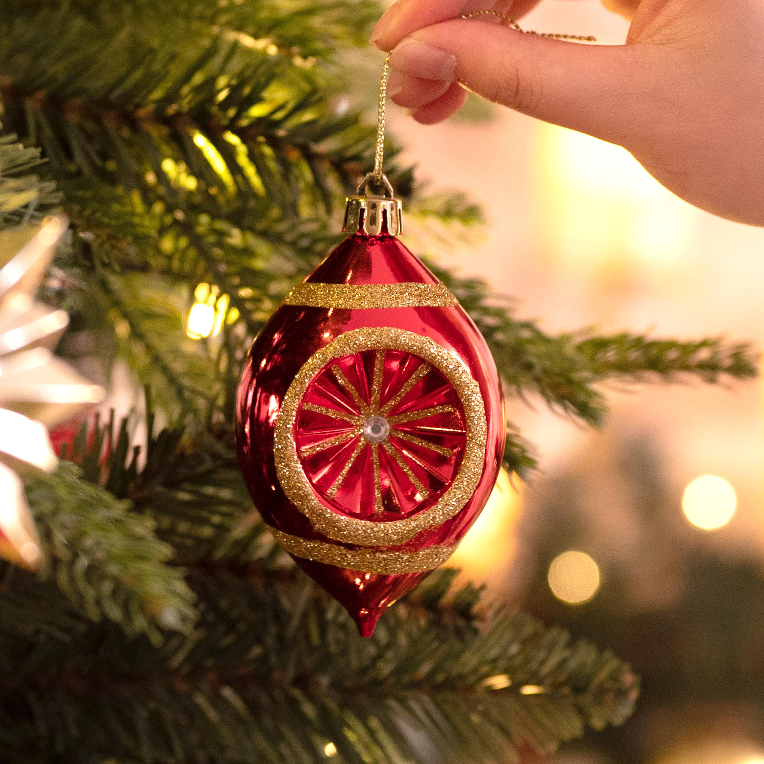 Valery Madelyn star topper placed on tree adding elegant focal point and shine