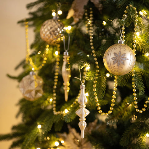 Valery Madelyn ornaments styled in table centerpiece offering event decor ideas