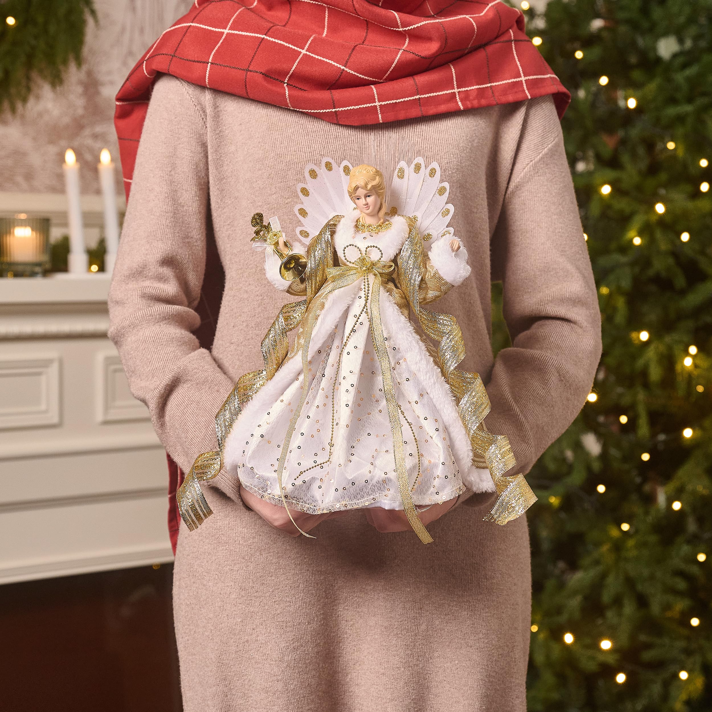 Valery Madelyn angel topper on a 9ft tree showing scaled fit and festive impact
