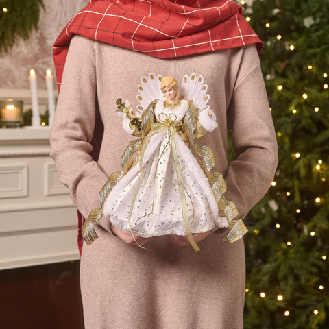 Valery Madelyn angel topper on a 9ft tree showing scaled fit and festive impact
