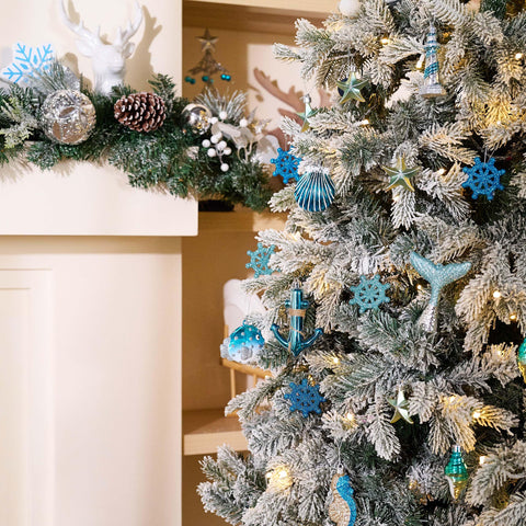 Valery Madelyn ornaments on a tree creating coastal holiday ambiance