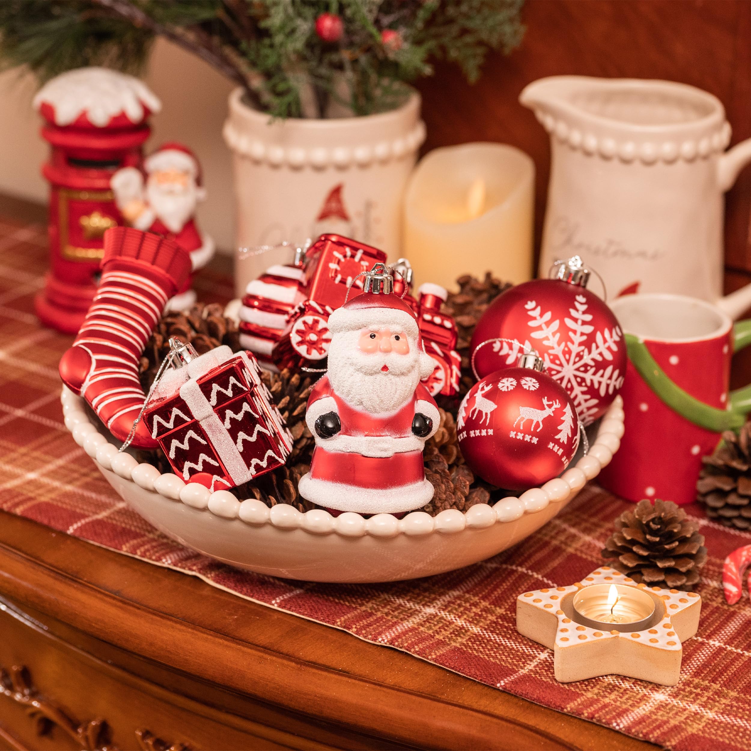 Valery Madelyn ornaments hung on a living room Christmas tree adding coordinated red-white charm