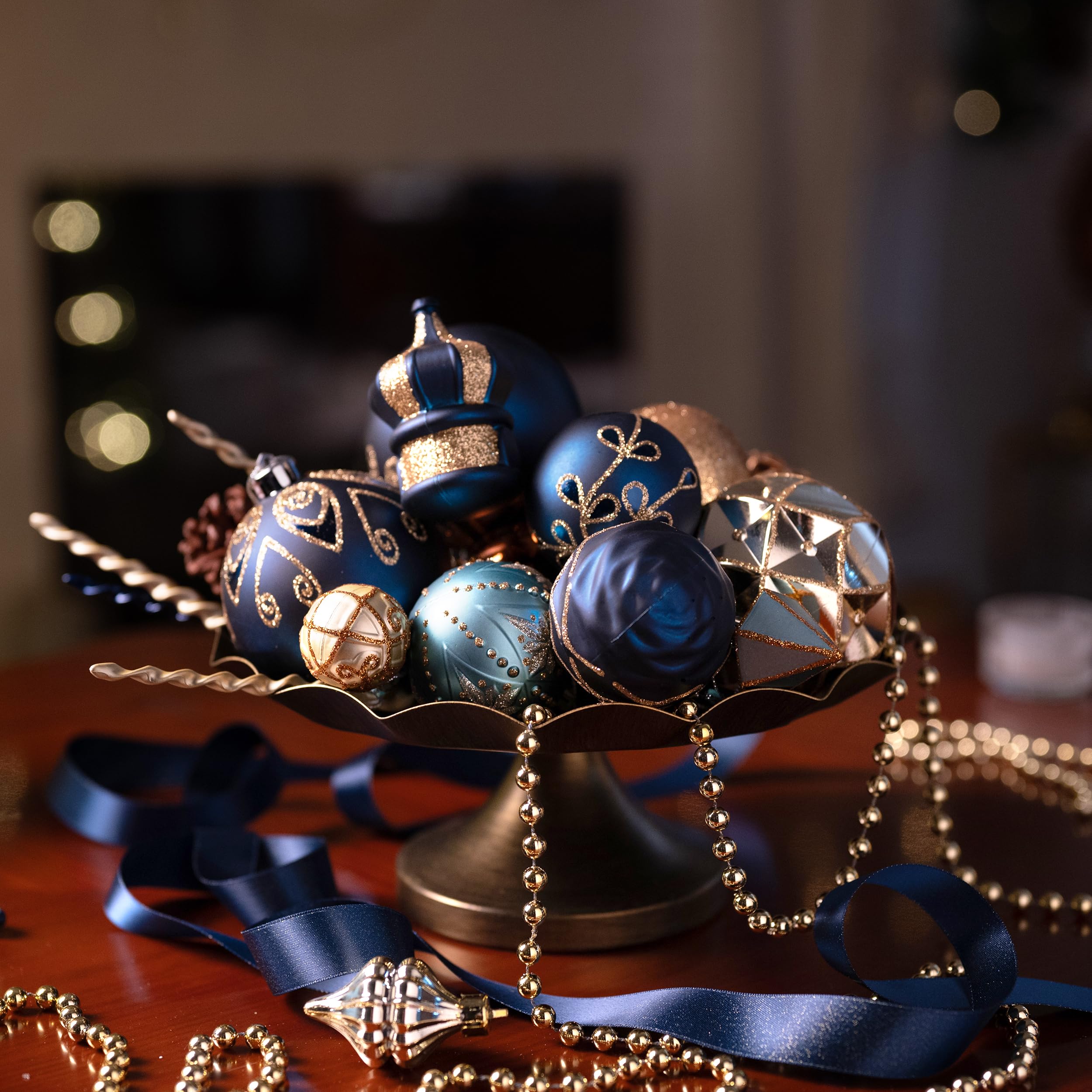 Valery Madelyn ornaments hanging on a decorated tree demonstrating cohesive holiday styling