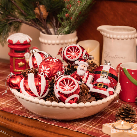 Valery Madelyn assortment of shapes laid out to display Santas, icicles, balls and gift-box ornaments for styling ideas