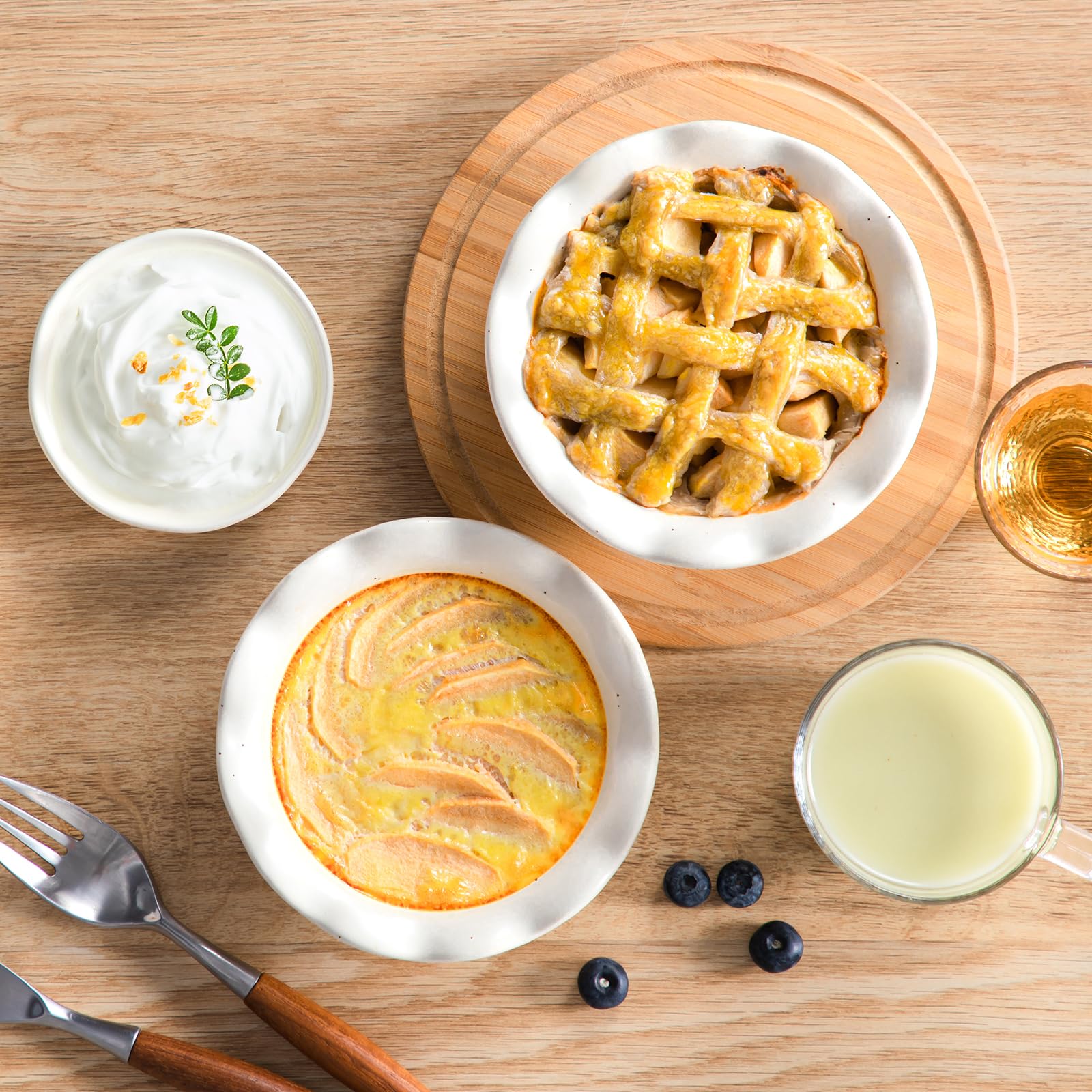 vancasso set presented on wooden table for rustic serving appeal
