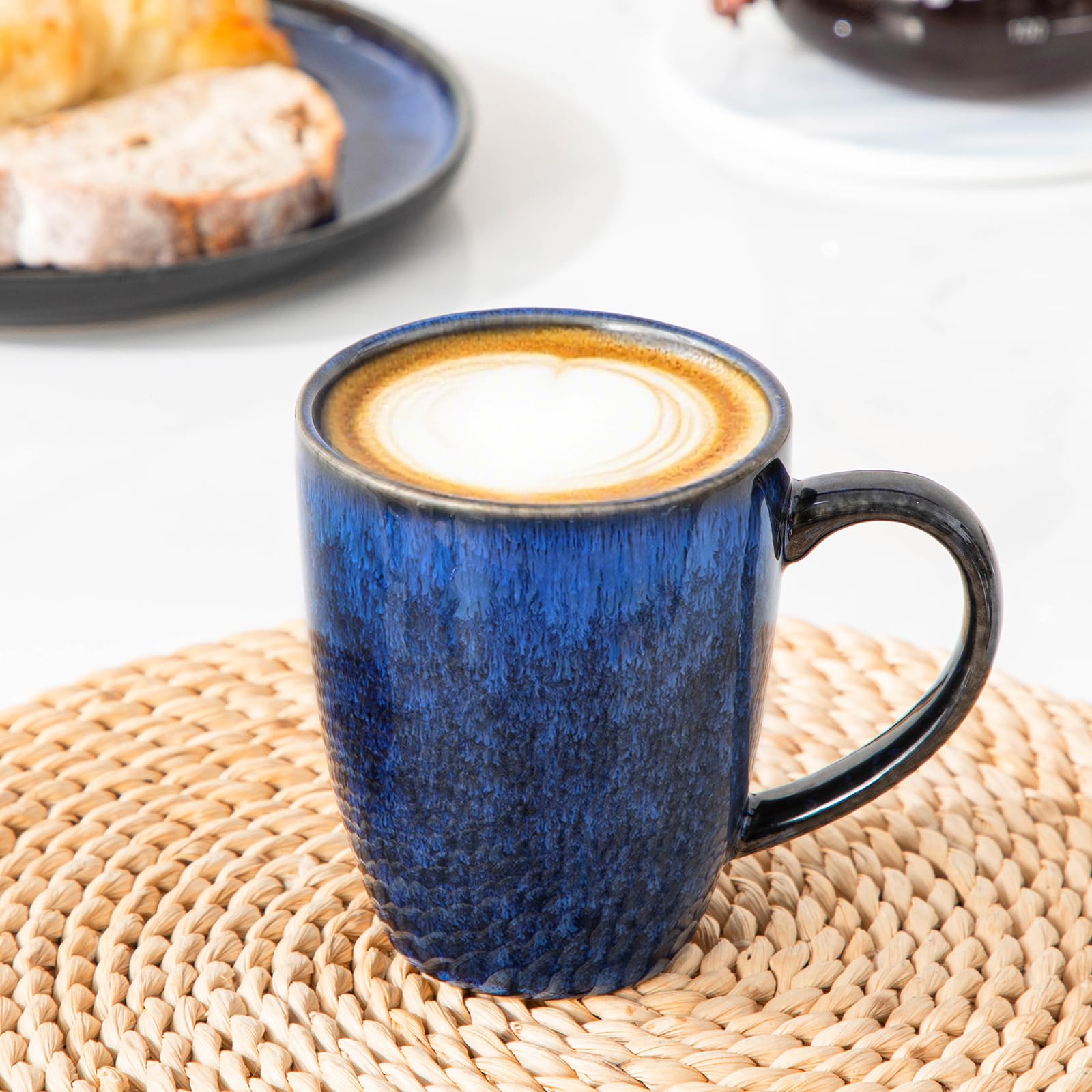 vancasso mugs on breakfast table conveying stylish serving and easy cleaning