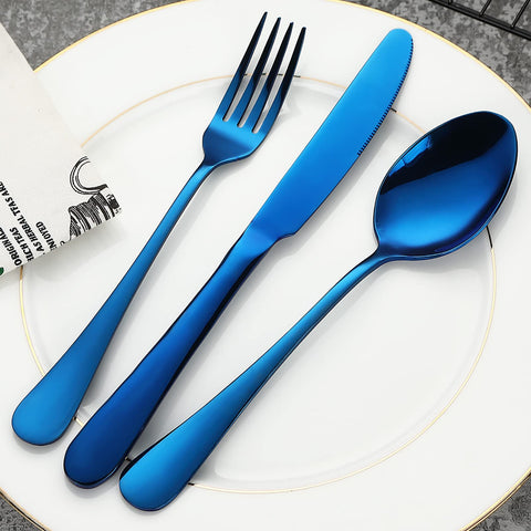 VANDBAO flatware next to a drinking glass for scale and balanced weight