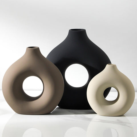 Vanselia front view of three ceramic vases showing modern centerpiece appeal