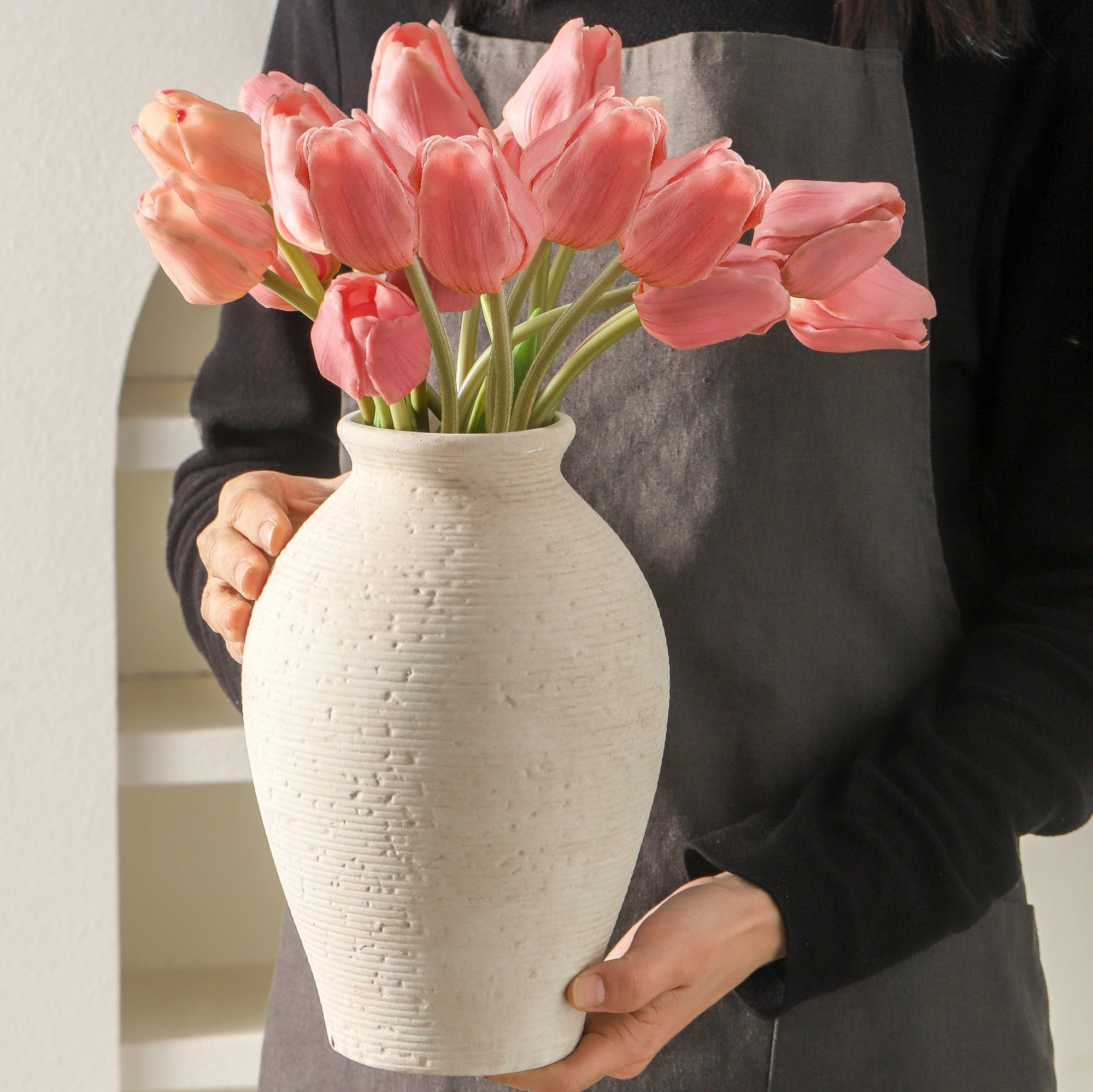 Vanselia on dining table with flowers providing a farmhouse centerpiece look
