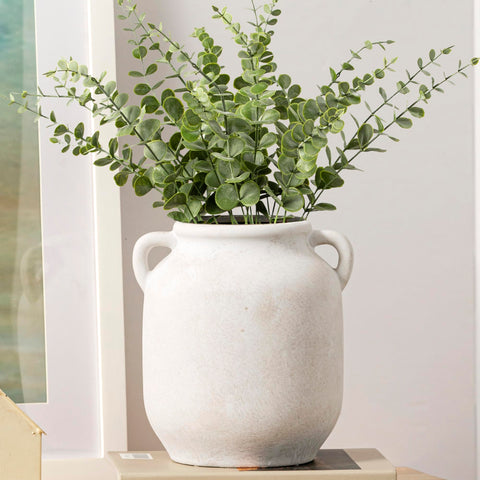 Vanselia placed on dining table with accessories, adds elegant centerpiece