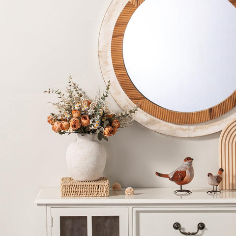 Vanselia styled on mantel demonstrating cozy living room appeal