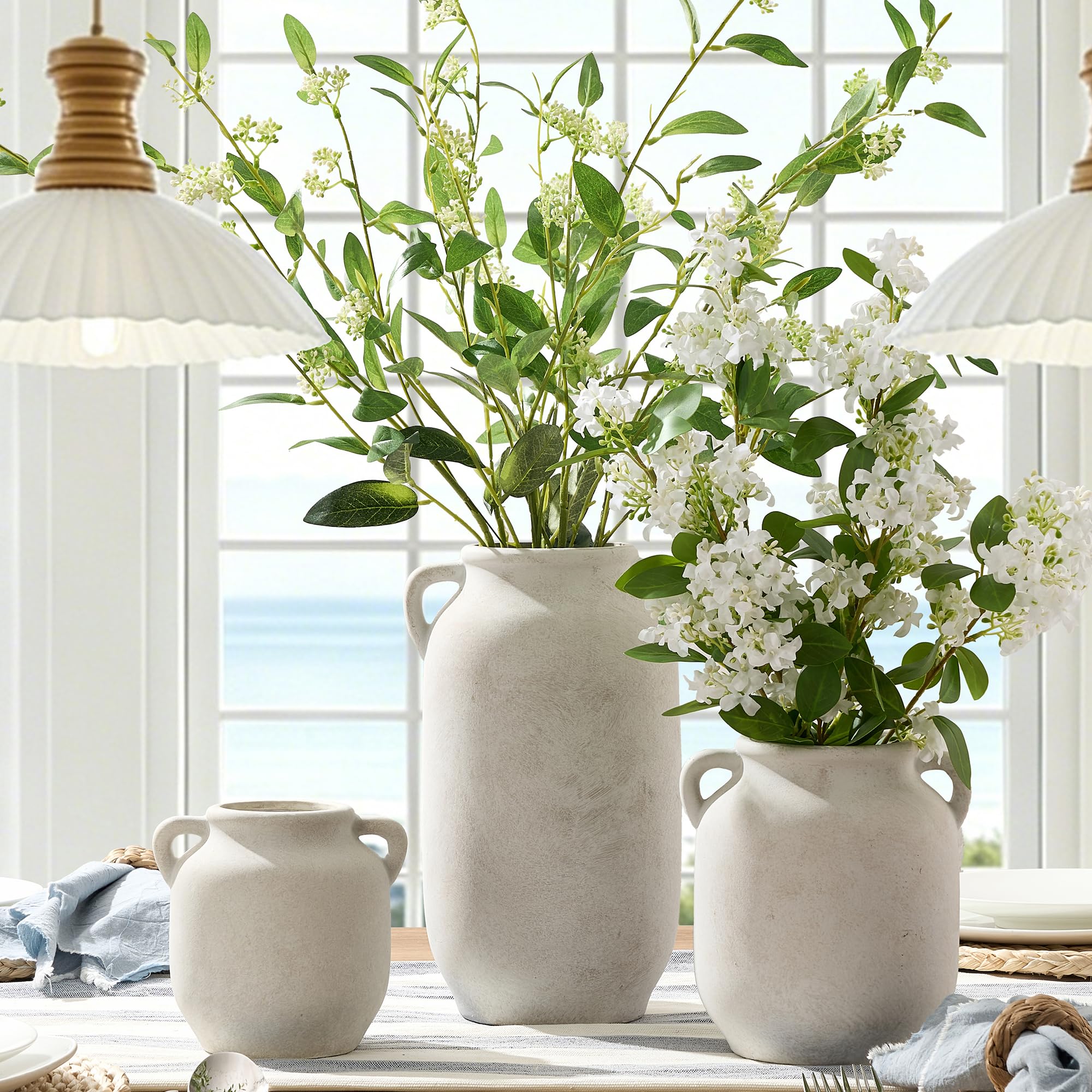 Vanselia holding fresh flowers on a mantel, showcases real-flower use
