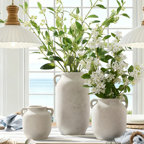 Vanselia holding fresh flowers on a mantel, showcases real-flower use