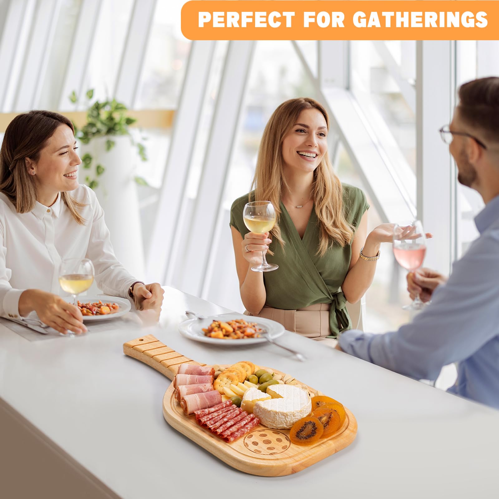 Vastsea board arranged with cheeses and fruit on a table showing stylish entertaining benefit