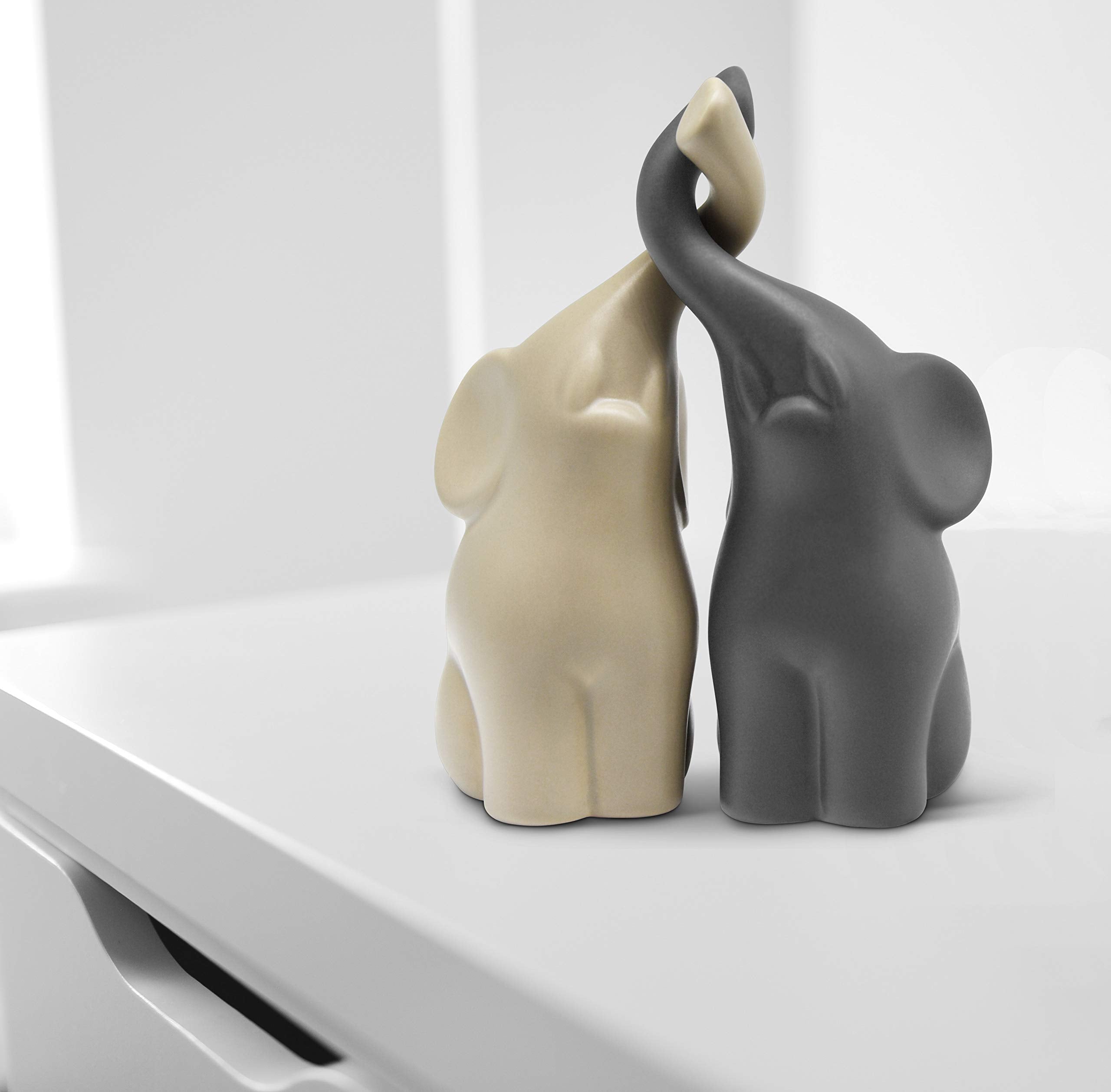 Vaudagio elephants side profile highlighting contrasting beige and grey colors