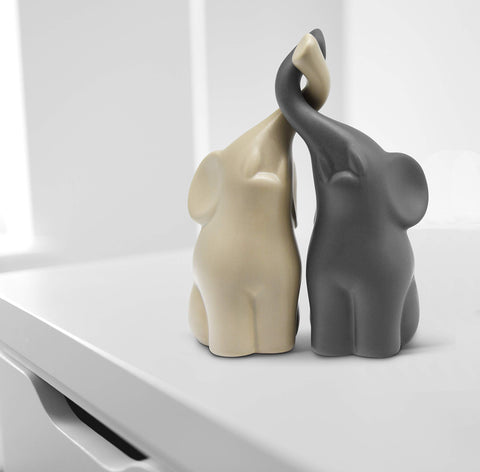 Vaudagio elephants side profile highlighting contrasting beige and grey colors