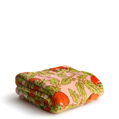 Vera Bradley throw front view showing Tomato Vines print and cozy look