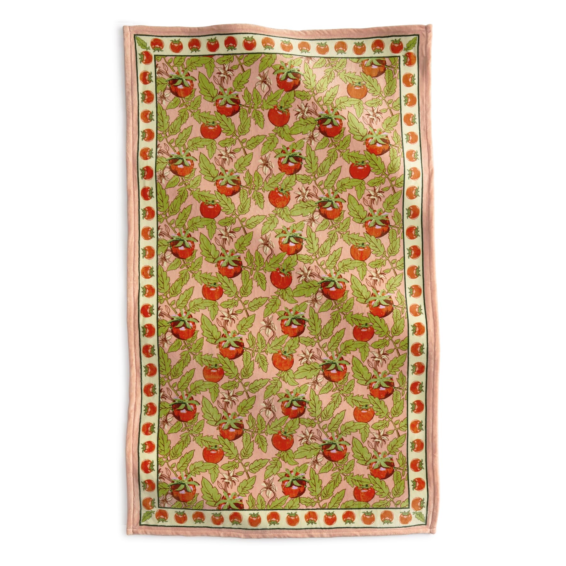 Vera Bradley throw styled on sofa showing decorative pattern and comfort