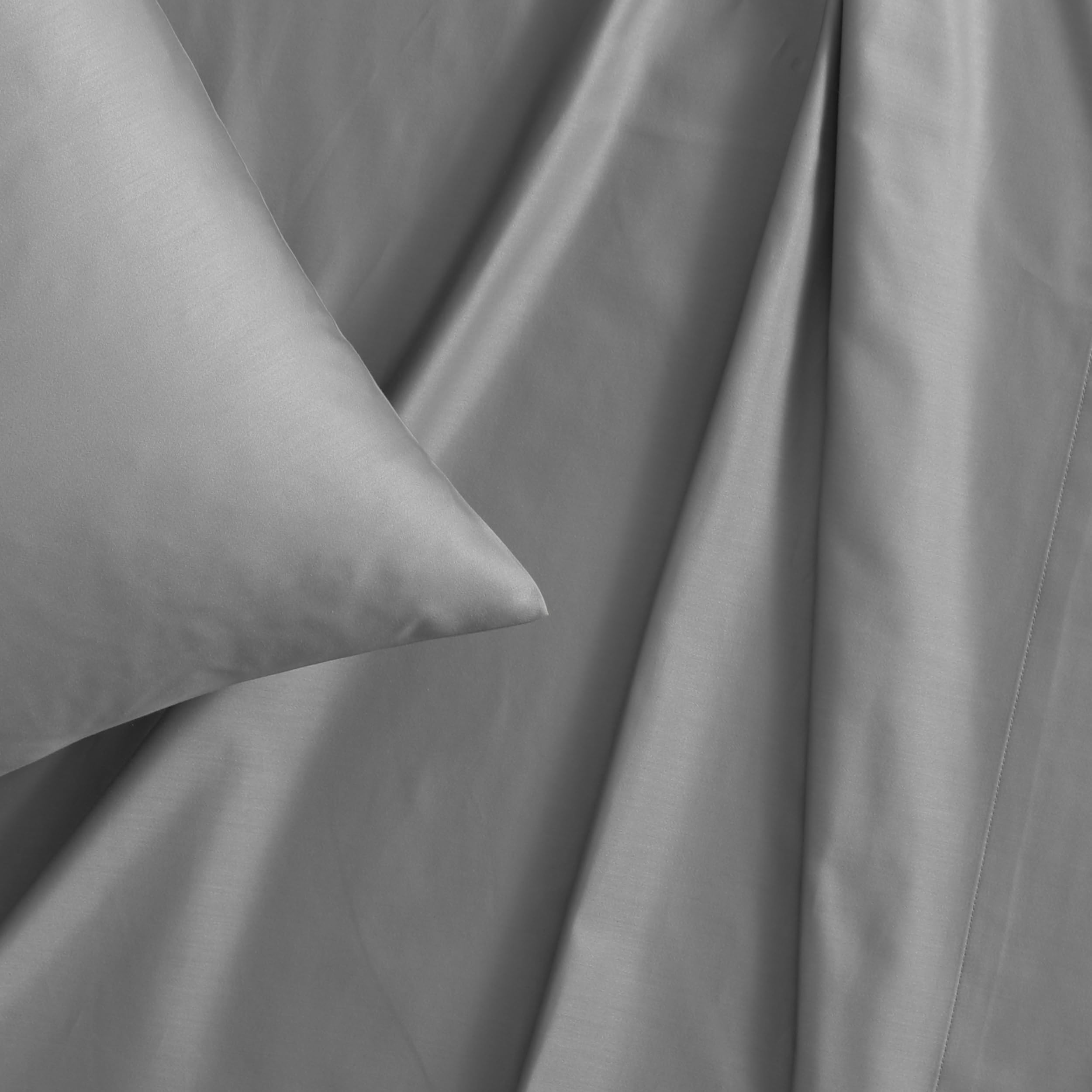 Vera Wang fitted sheet corner showing deep pocket and elastic for secure fit