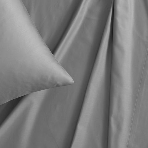 Vera Wang fitted sheet corner showing deep pocket and elastic for secure fit