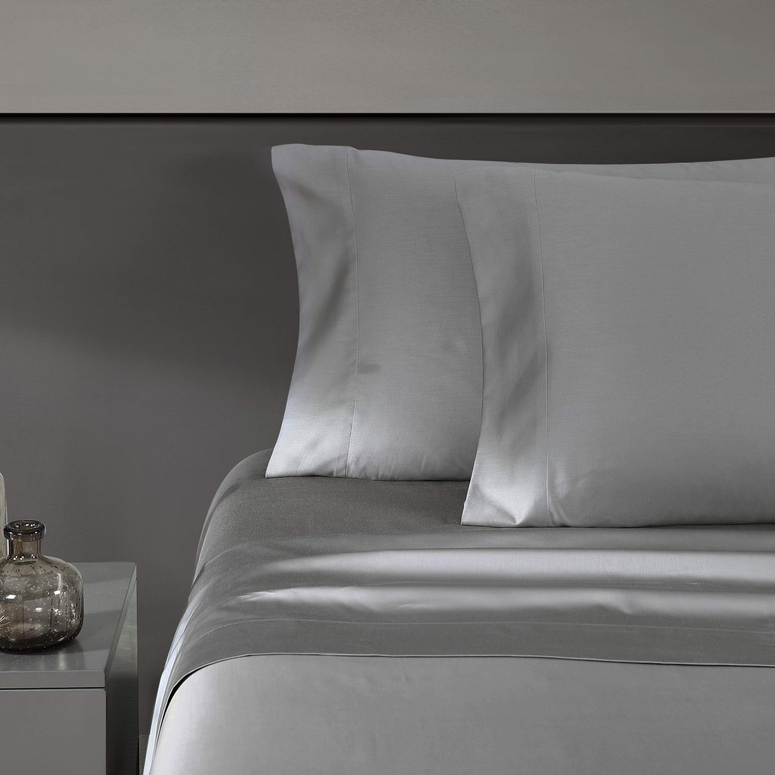 Vera Wang front packaging showing steel grey king sheet set and brand appeal