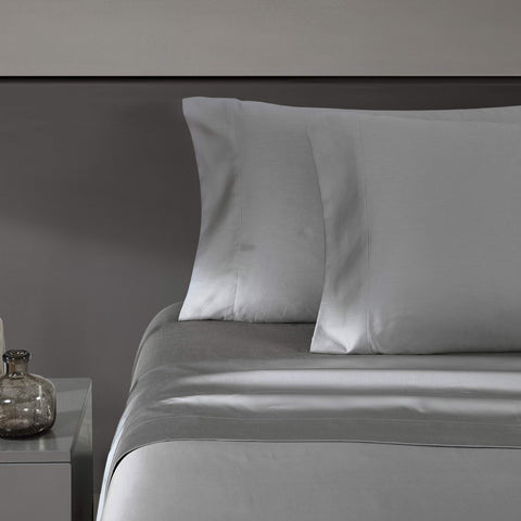 Vera Wang front packaging showing steel grey king sheet set and brand appeal