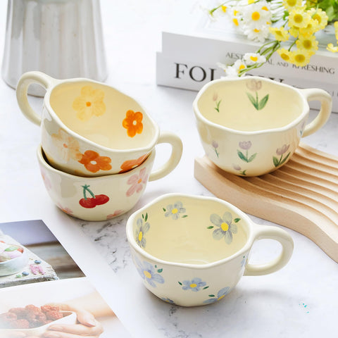 Vesici four mugs with spoons arranged on a wooden table, ideal for brunch styling