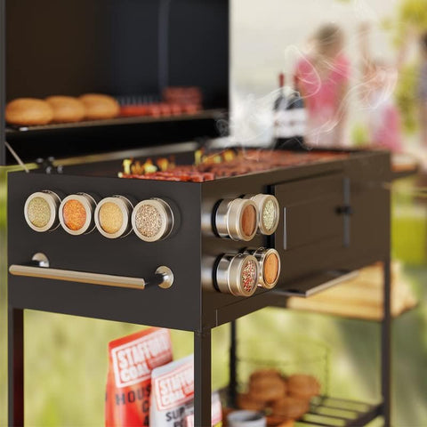 Vetacsion tins arranged at backyard barbecue offering portable seasonings convenience