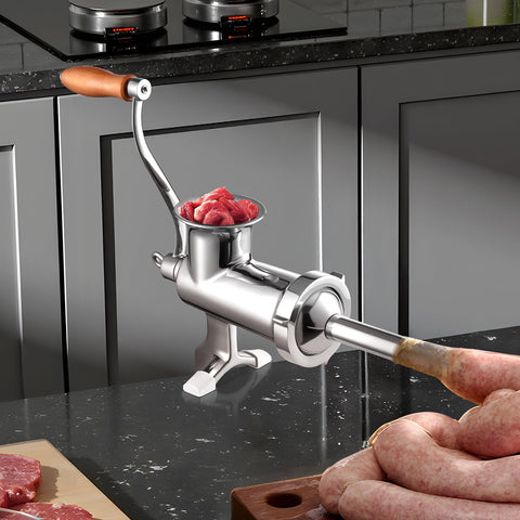 VEVOR grinder in use on kitchen countertop producing fresh ground meat benefit