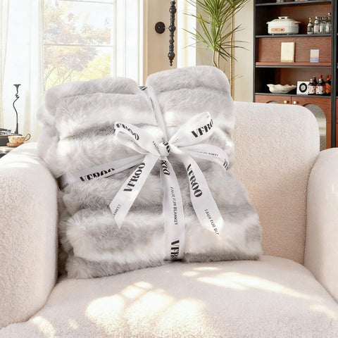 VFROO draped over bed creating a neutral, sophisticated accent for bedroom design