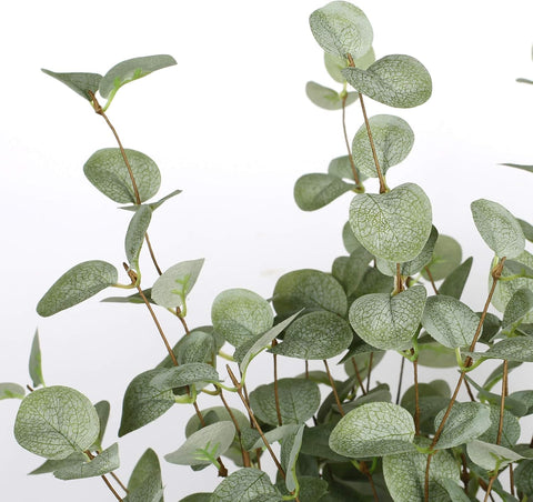 VGIA eucalyptus stems styled in a wedding centerpiece for visual impact