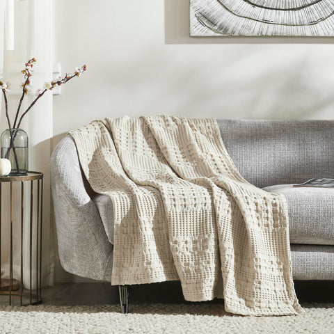 VHC Brands throw draped on sofa offering cozy layered living room appeal