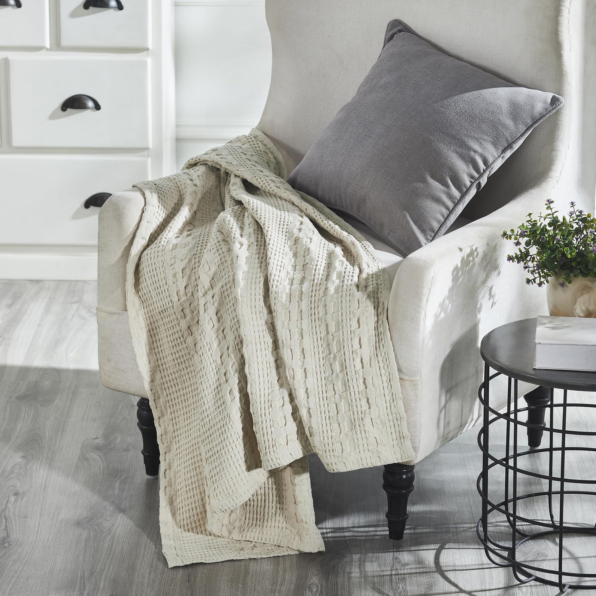 VHC Brands throw beside book showing size scale and comfortable reading companion