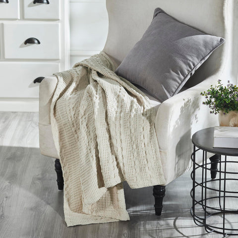 VHC Brands throw beside book showing size scale and comfortable reading companion