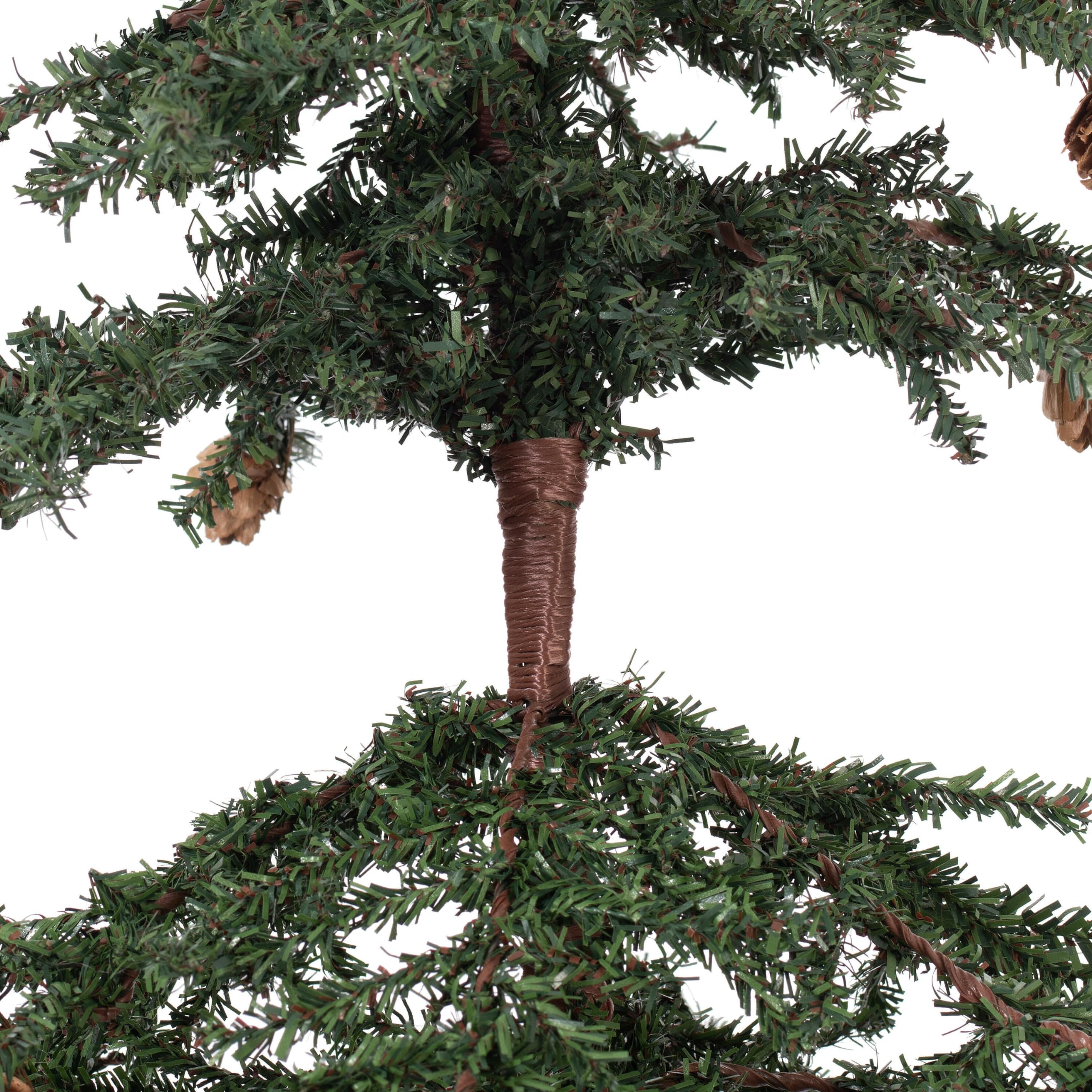 Vickerman size scale beside book showing 3.5-foot height and small-space fit