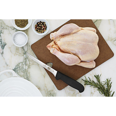 Victorinox bread knife cutting crusty loaf cleanly to show effortless slicing without crushing