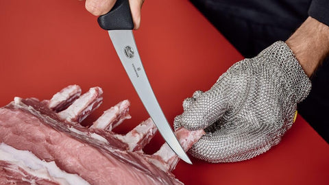 Victorinox Fibrox Pro closeup of handle and curved blade, ergonomic grip for control